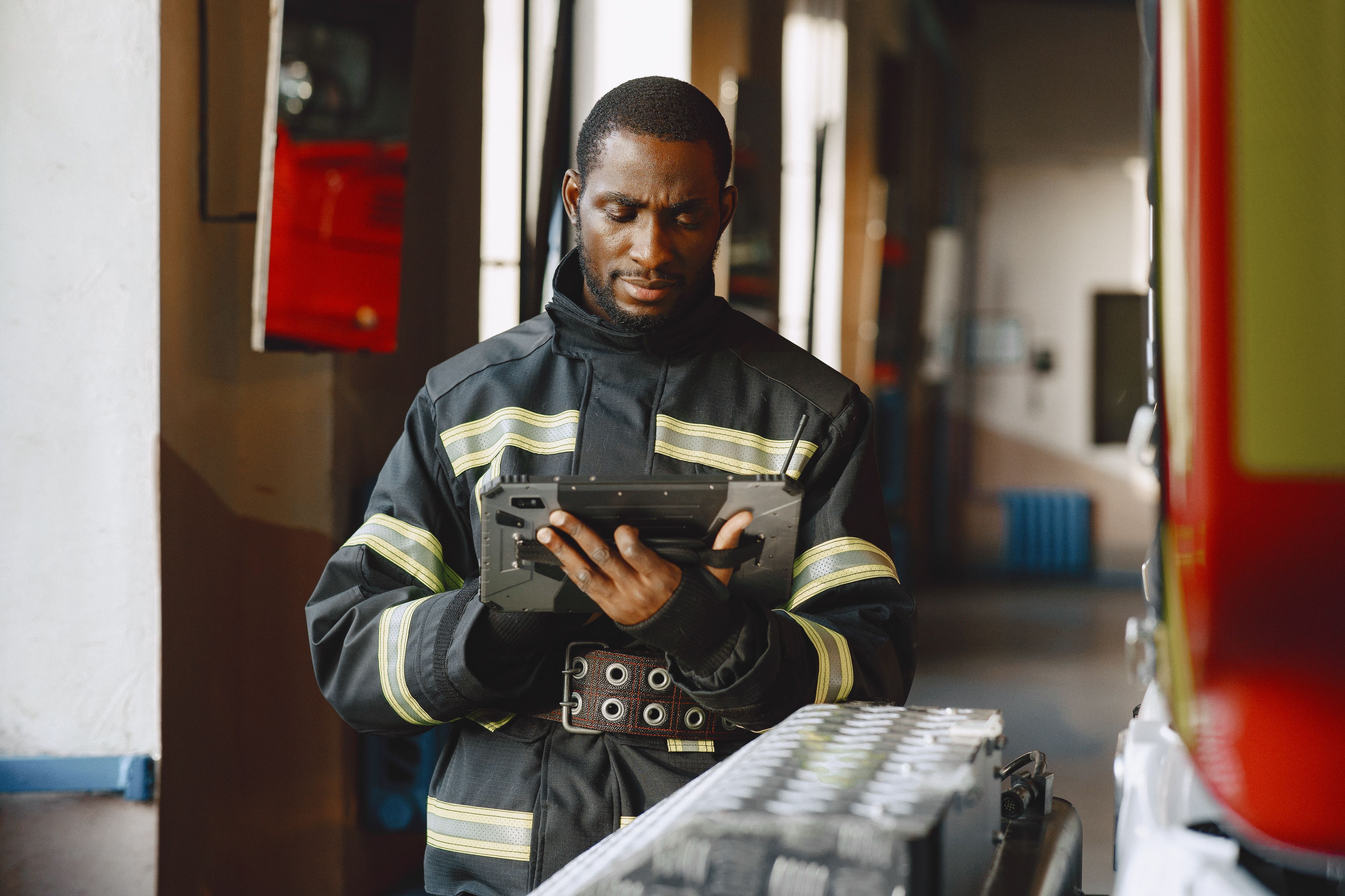 A worker using a tablet on site